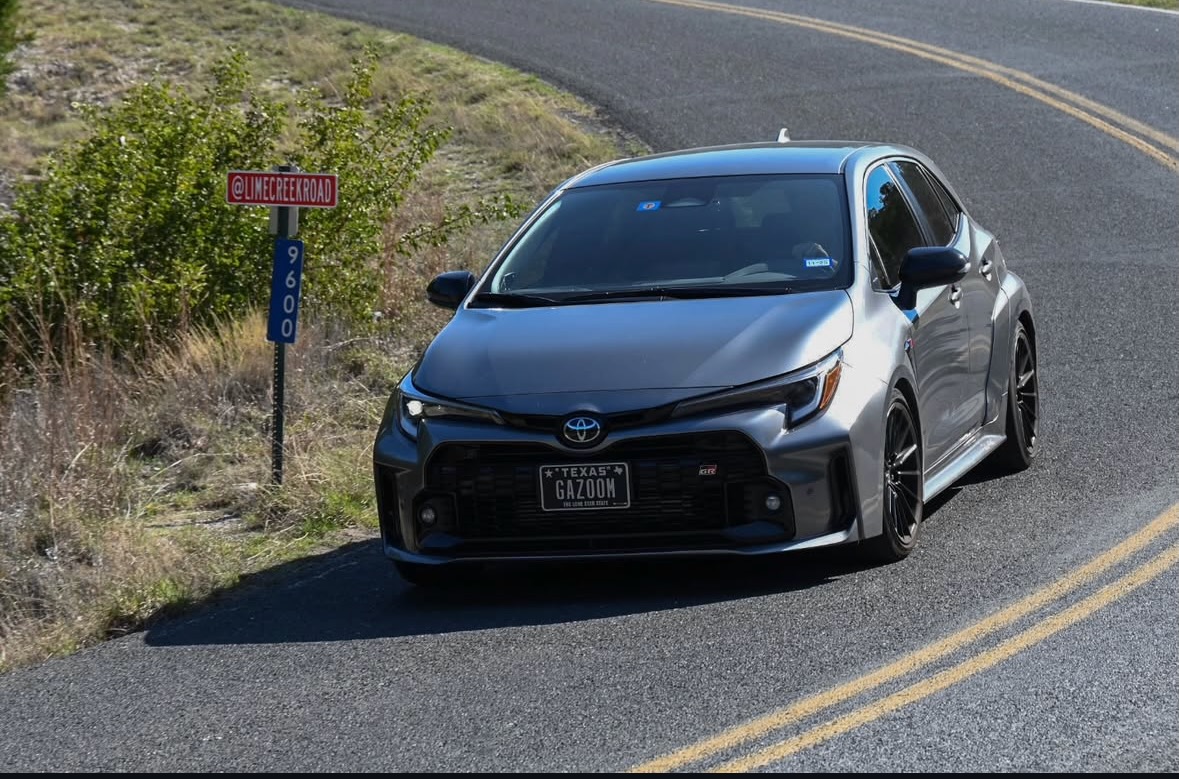 GR Corolla rounding a bend on Lime Creek Road